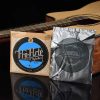 Cuerda de guitarra + Uñetas