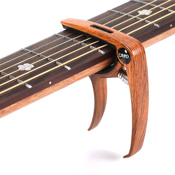Capotraste De Aluminio Para Guitarra (madera) Soporte+uñeta